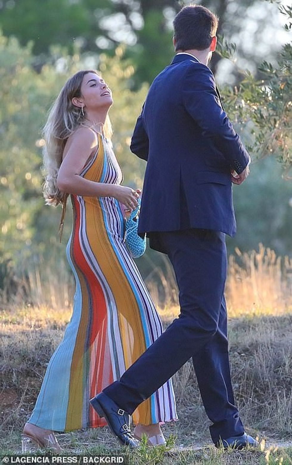 61877699 11161517 Cute couple Gerard s simple suit allowed Clara s fabulous frock m 143 1661883321583