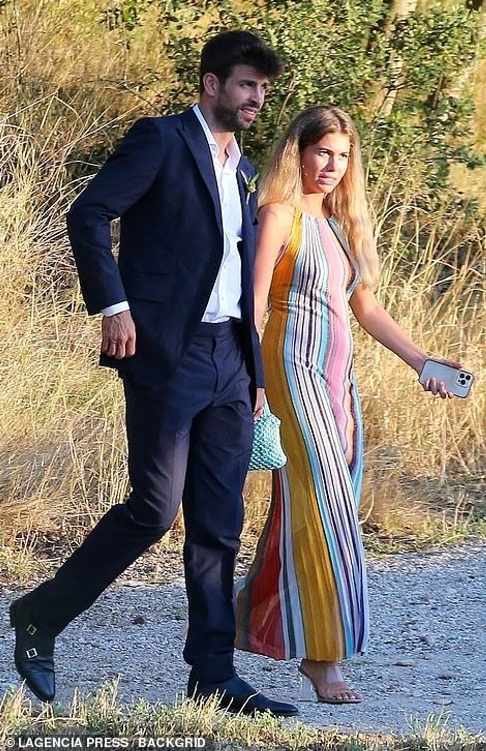 61877723 11161517 Stylish The aspiring PR kept attention on her striped maxi dress a 174 1661883888141