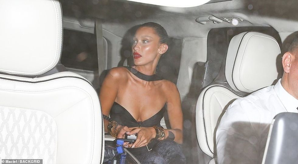 62302249 11202155 Pulling up Bella Hadid arrived at the venue rocking a bright red a 103 1662932102431