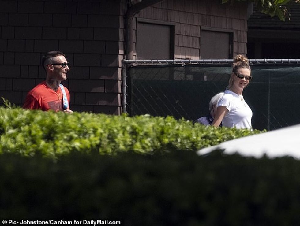 62633177 11239853 DailyMail com spotted Adam Levine smiling with his wife Behati P a 6 1663880559582