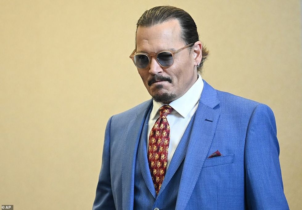 62908221 0 Defamation trial Depp is shown last May at the Depp v Heard tria m 53 1664414295577
