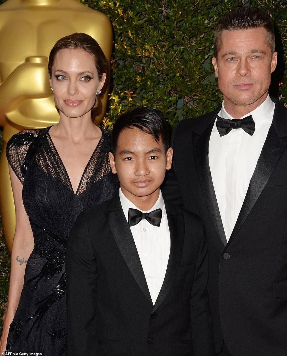 63120163 11281083 Jolie and Pitt are pictured with their son Maddox in November 20 a 14 1664931854077
