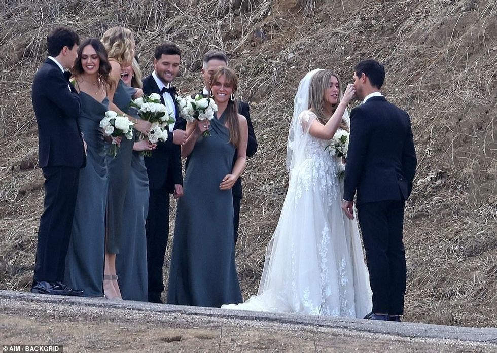 64480461 11420989 Happy for them Their wedding party was all smiles as they gather a 67 1668299481787