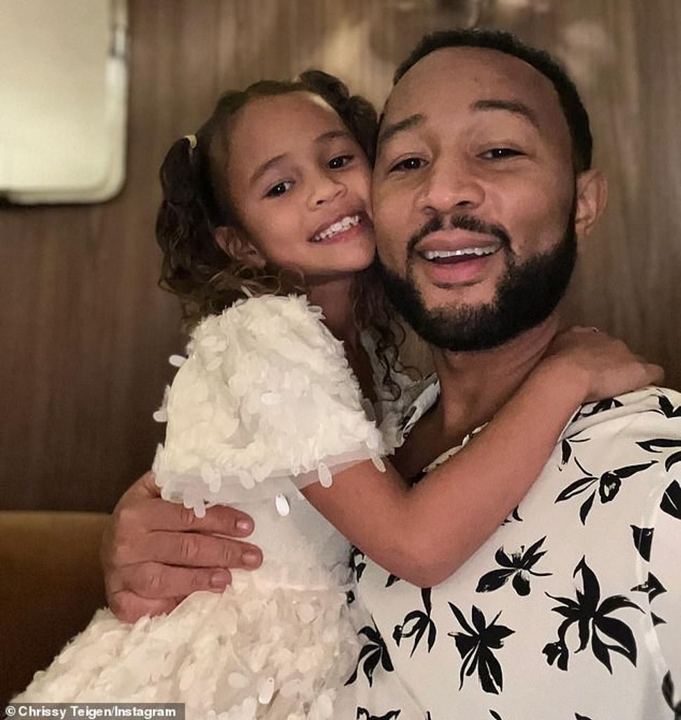 64952147 11471029 Daddy s girl Luna the couple s firstborn child cuddled up to her a 65 1669429291964