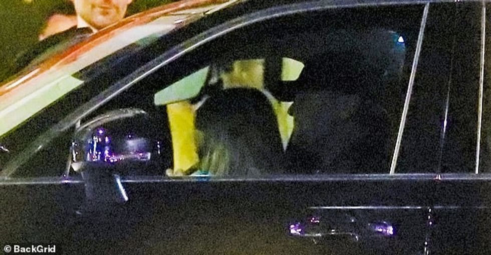 65822025 12741931 He s driving The pair put on an affectionate display before clim a 3 1699855838192