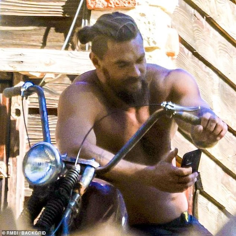 65858701 11567079 Chopper The action star s long hair was pulled back into a pony a 1 1671738166991