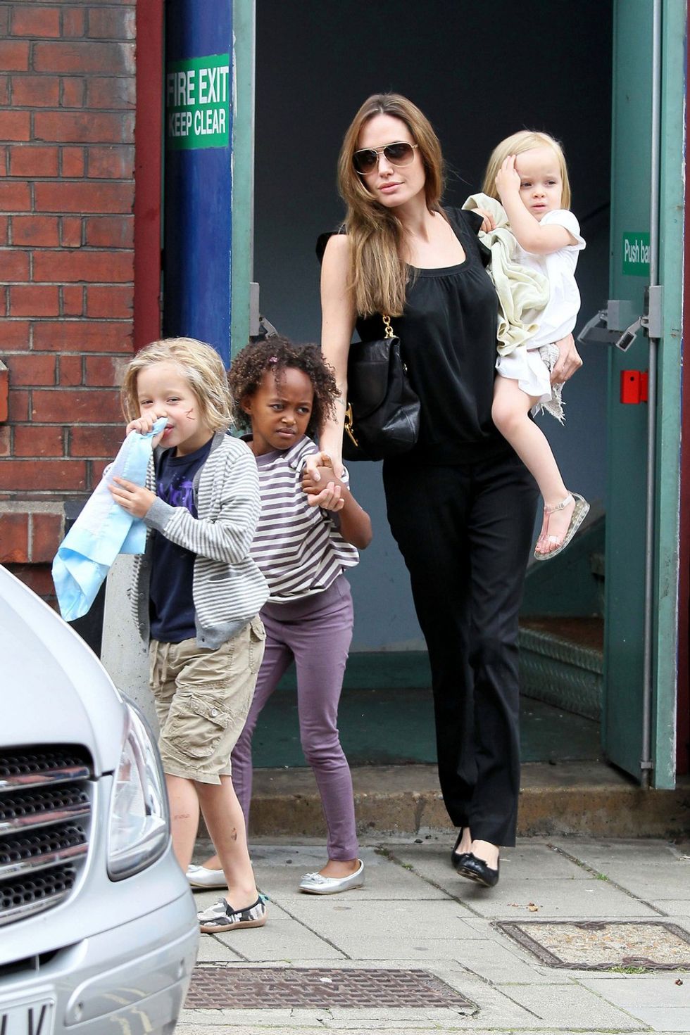 66234, LONDON, UNITED KINGDOM - Sunday September 4, 2011. Angelina Jolie and Brad Pitt take their brood to the cinema to see