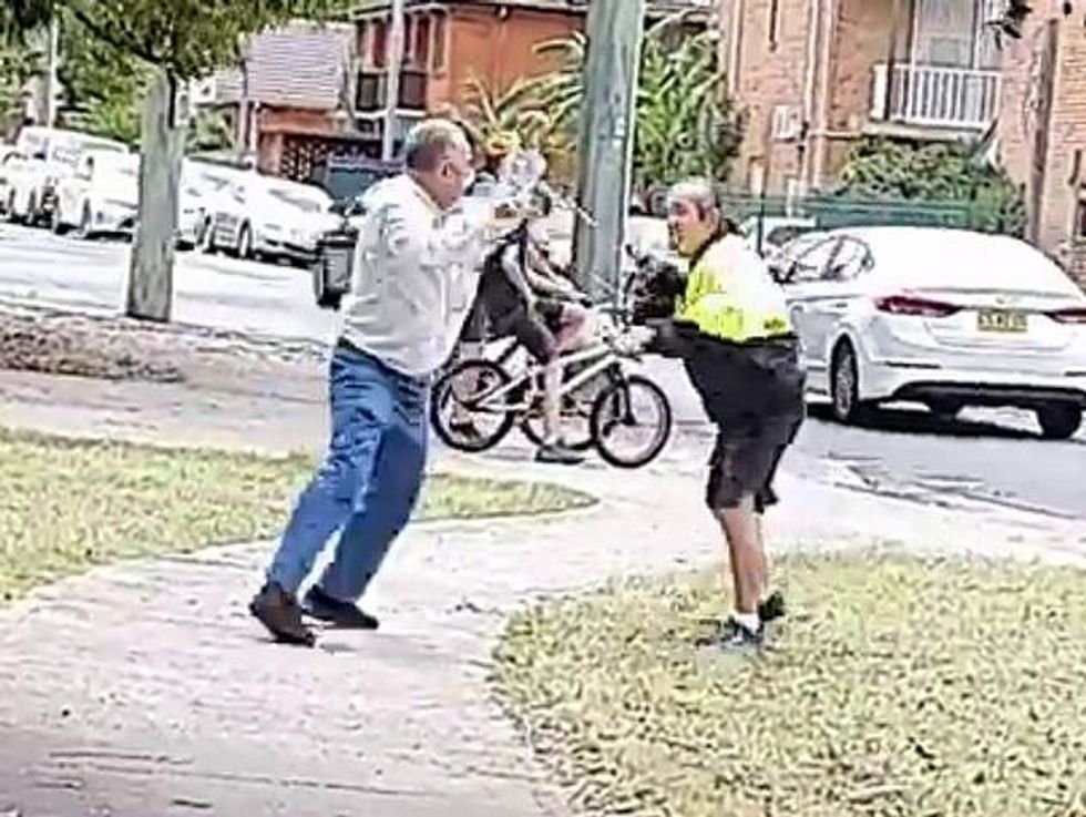 66298473 11609277 Two men were spotted fighting each other with sticks reportedly a 3 1673094592983