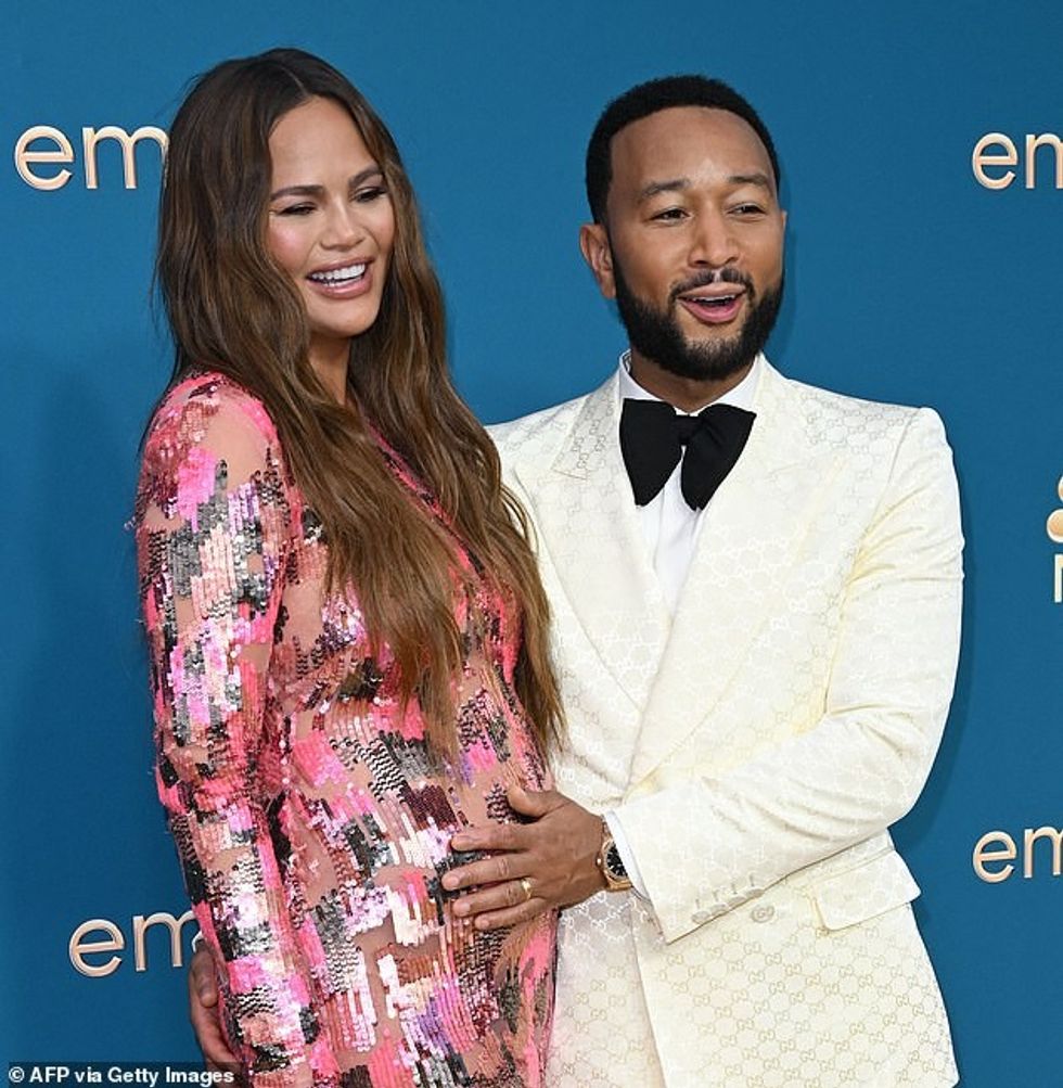 66566253 11634463 Proud parents Legend and Teigen pictured at the Emmy Awards in S a 6 1673684348521