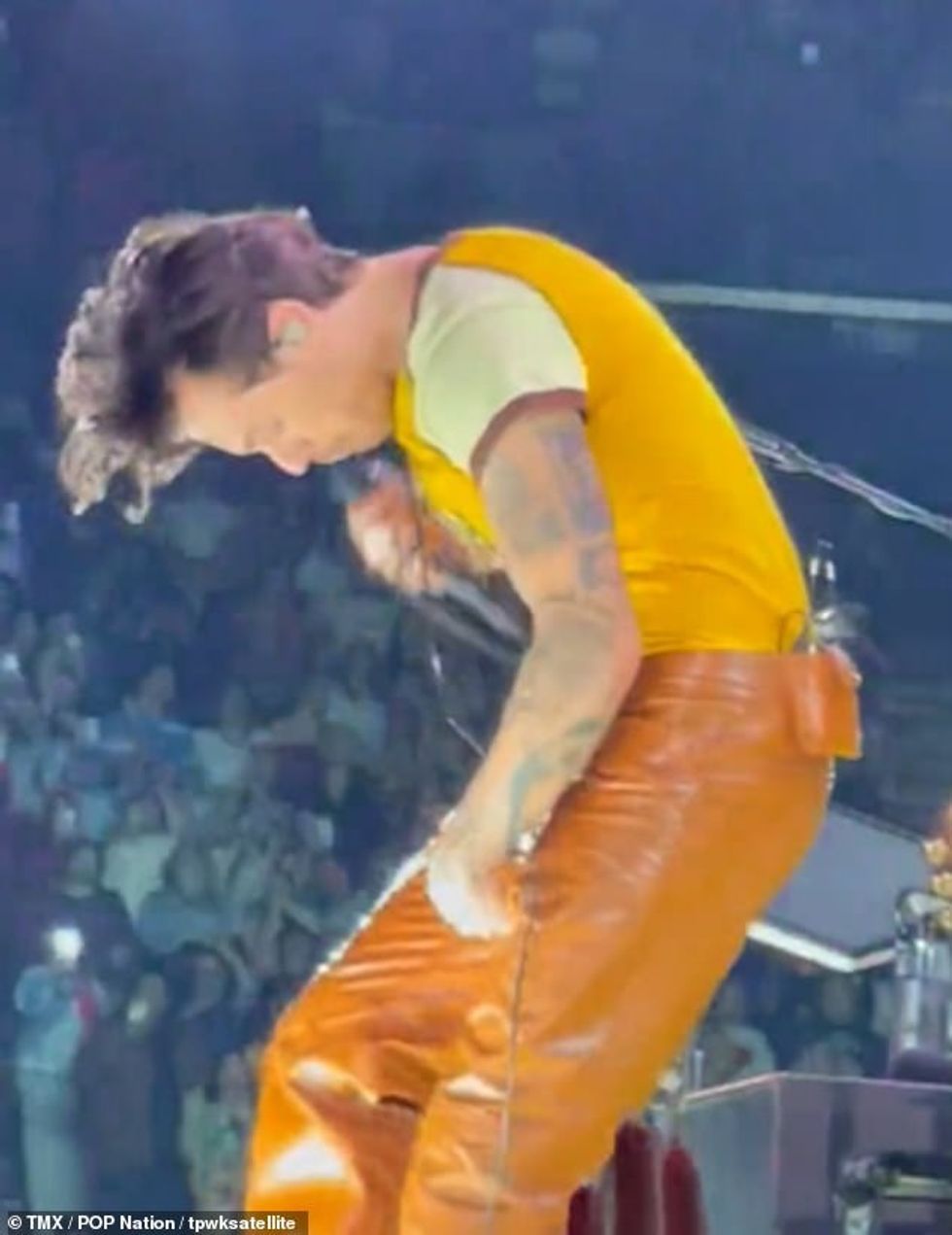 67038069 11683909 Rip The singer 28 suffered a wardrobe mishap during his Los Ange a 94 1674827838902