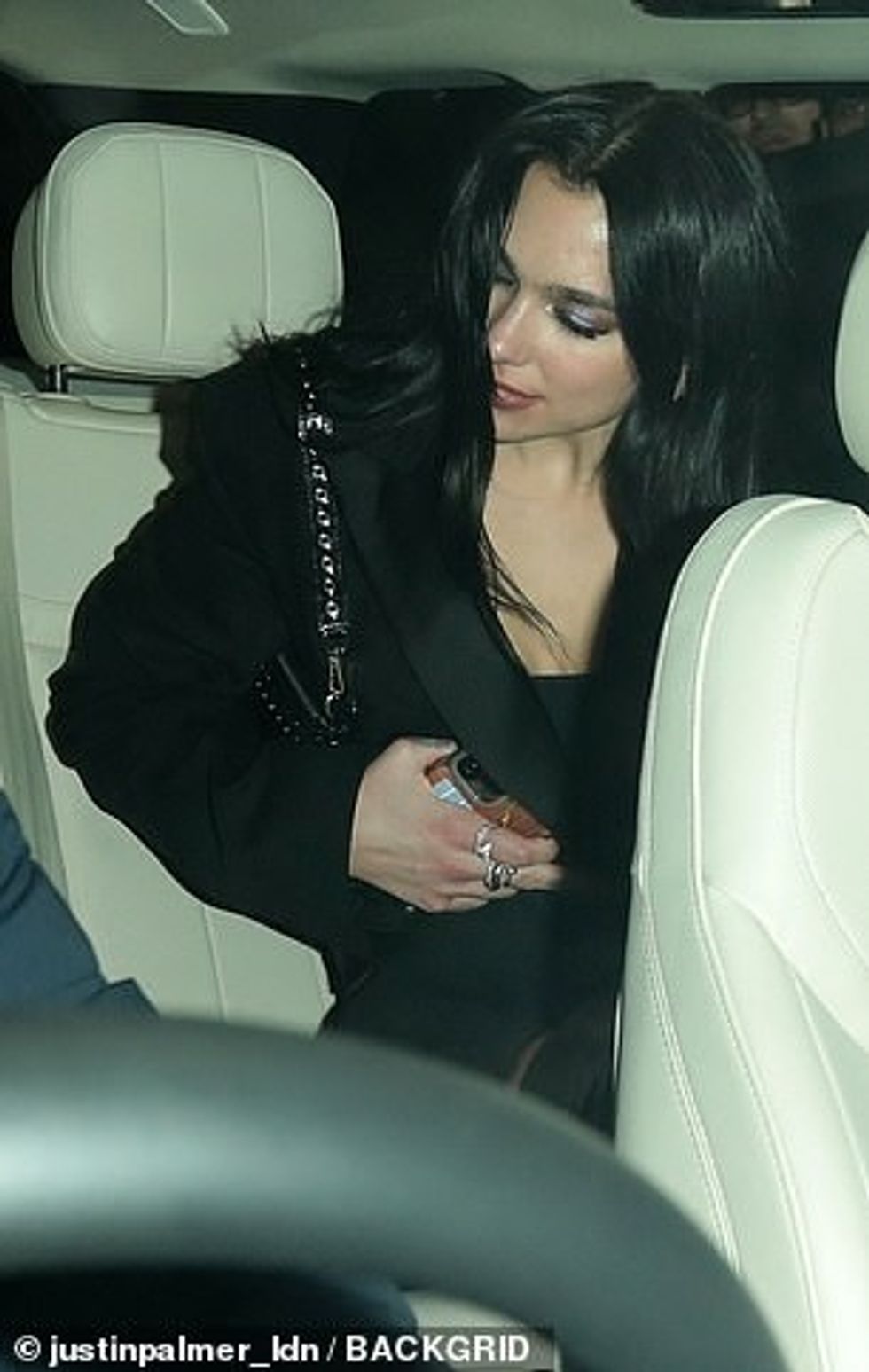 67881465 11772137 Hometime The pair were pictured together climbing into the back m 80 1676905463037