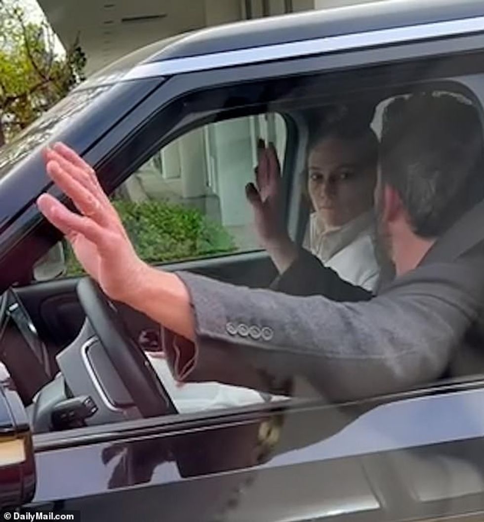 70929249 12078457 Ben could be seen gesticulating wildly as he talked with his wif a 29 1683991903460