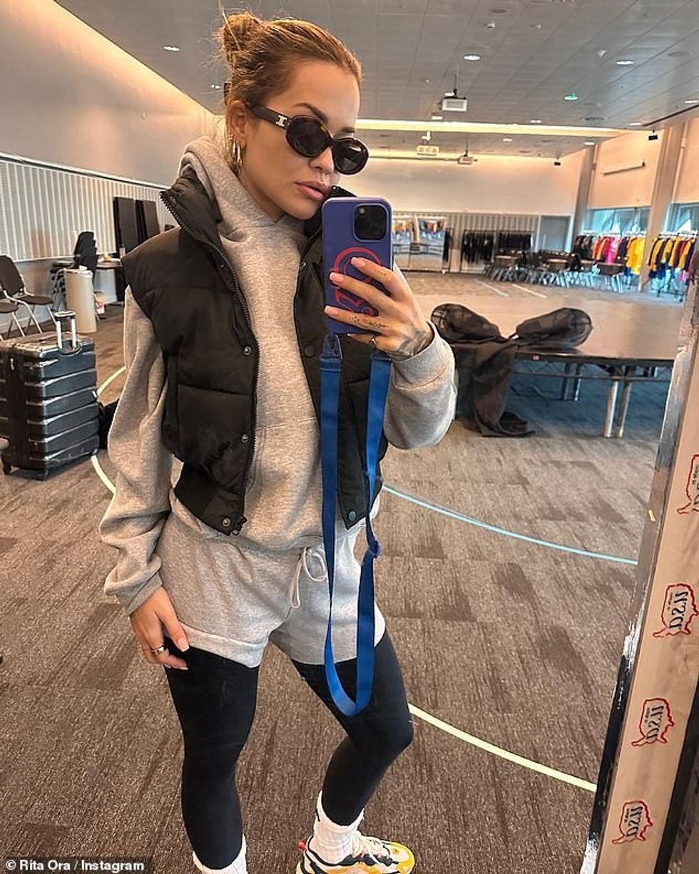 70930373 12078797 Low key The musician then wore a sporty pair of grey shorts with a 50 1683931795702