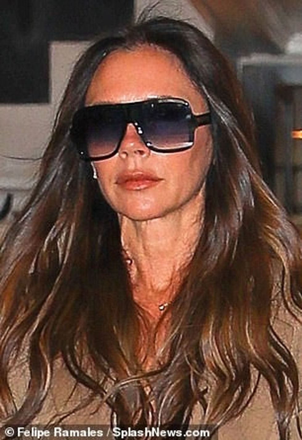 71211169 12105621 Elegant Victoria recently sported a brown suit made up of wide l m 108 1684583519730