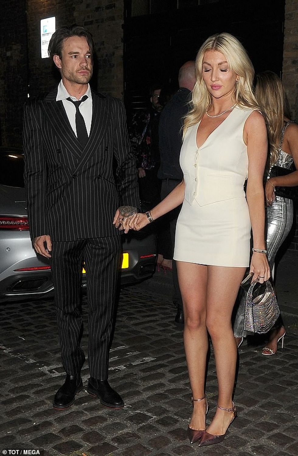 71945661 12176913 Sweet The duo intertwined their fingers as they stood outside th m 17 1686296917409