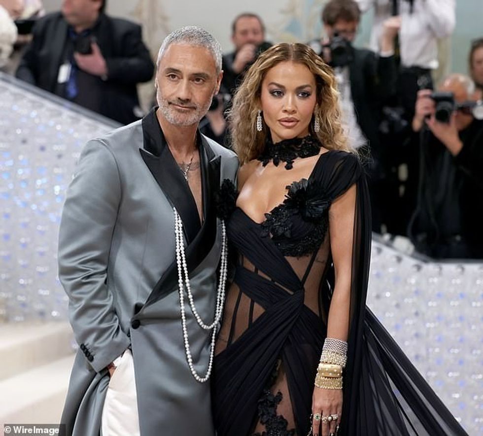 73336533 12325627 Cute couple Her latest outing comes after Rita made a very cheek a 86 1689982018845