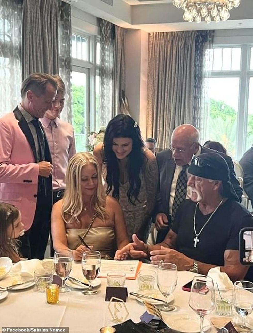 73618099 12338003 Daily signing signing the marriage license as a witness during t a 3 1690359785856