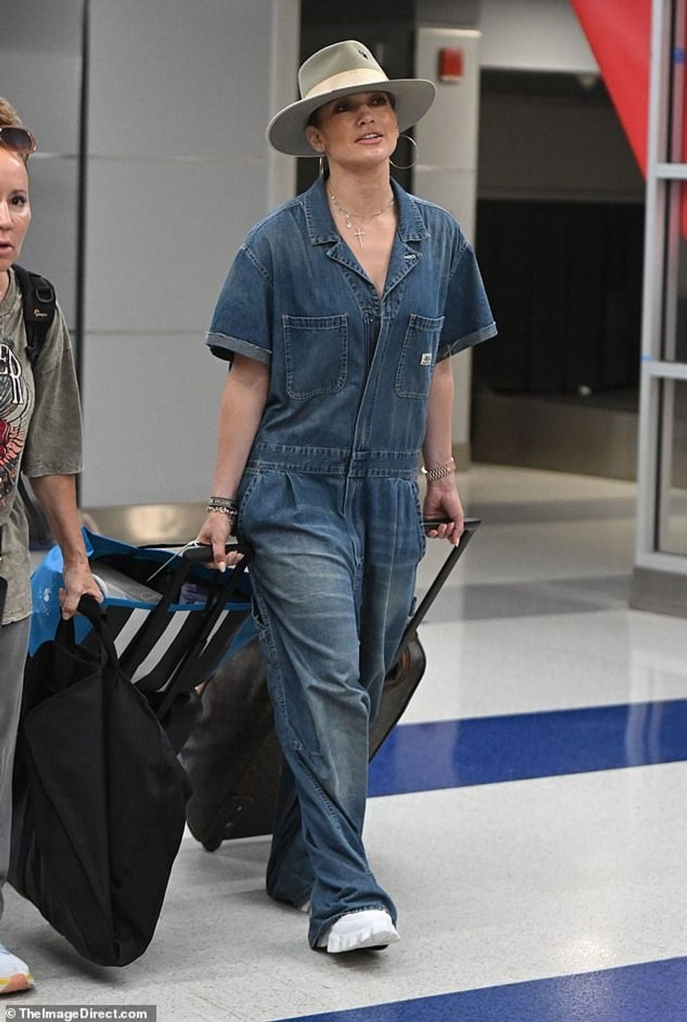 74269375 12402435 Return trip JLo was spotted Sunday afternoon arriving at JFK Air a 28 1691945149047