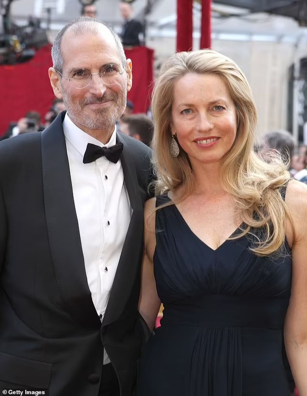 74750399 13633637 The late tech CEO left and his wife Laurene Powell are pictured a 13 1720988531659