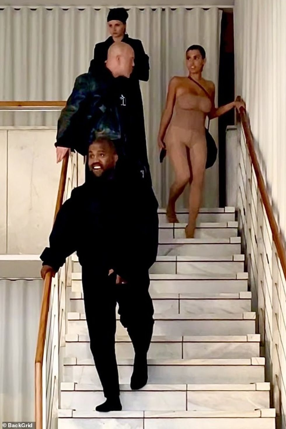 75489043 12524733 All black outfit West was spotted in an oversized jet black hood a 6 1694817856359