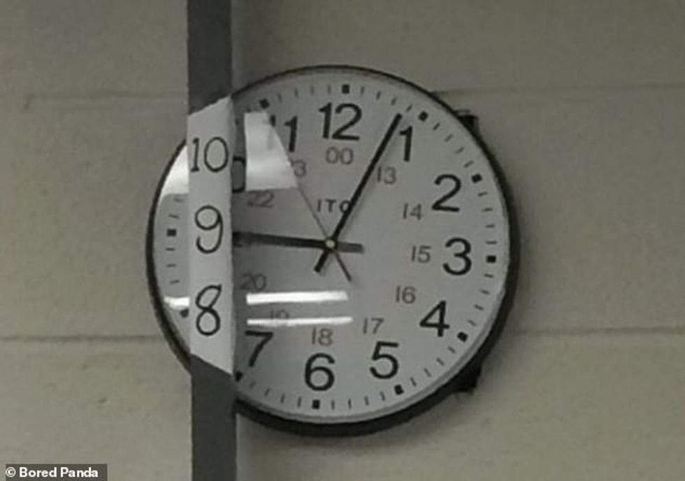 75529699 12528533 While a pole was placed in front of an office clock luckily the a 134 1694967943398