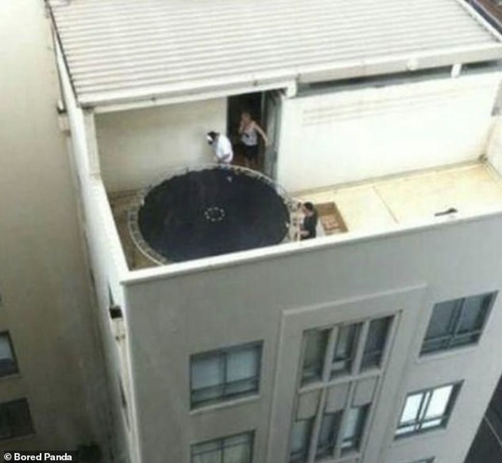 75529905 12528533 While people put a trampoline on top of a building which could d a 125 1694967943317