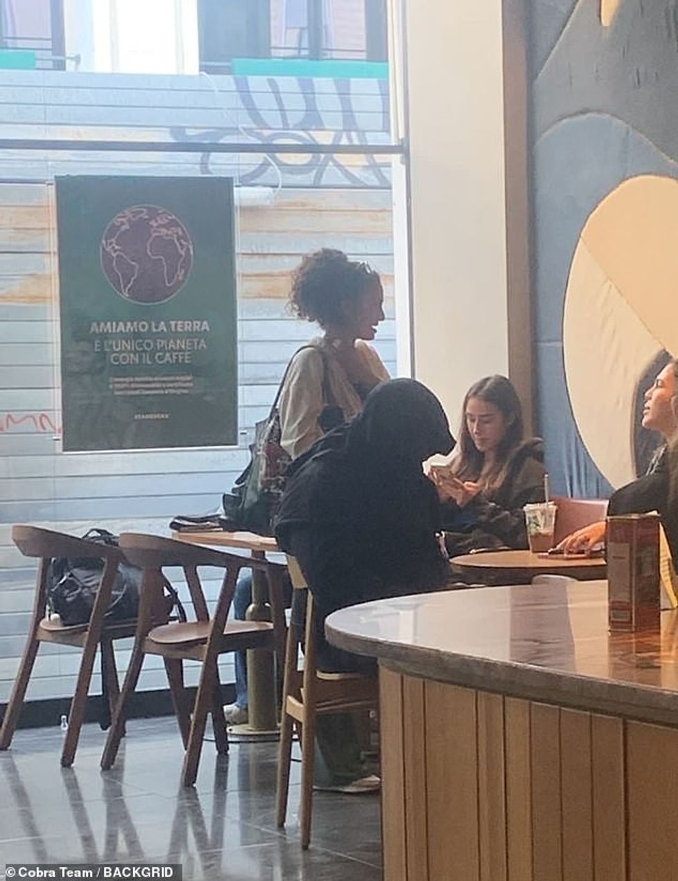 76280253 12605547 Interaction Customers inside the Starbucks were stunned when the a 53 1696706800765