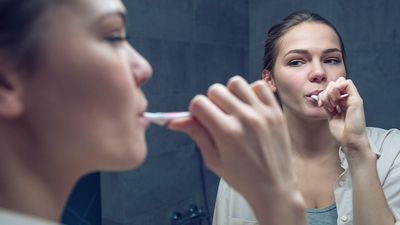 2022/08/Brushing_Teeth_Mirror_Female-1200x628-Facebook-1200x628-1.jpg