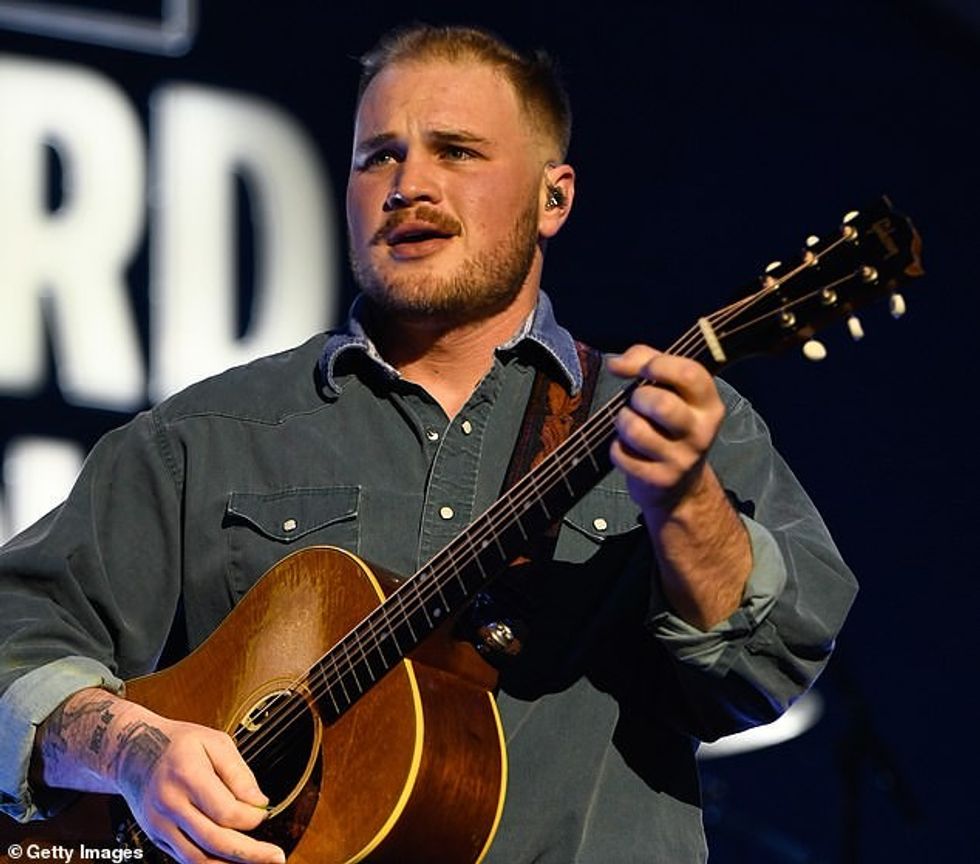 92498011 14141331 Bryan is pictured performing in Las Vegas this February a 2 1732906279317