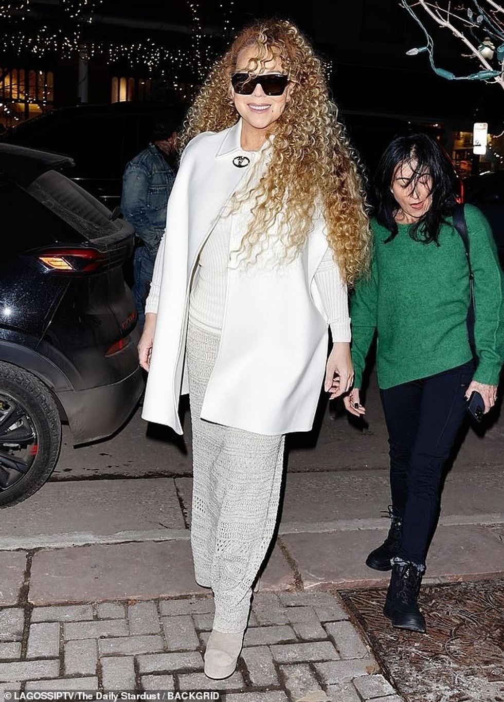 93374679 14216119 Mariah Carey wore a monochrome all white look as she stepped out m 14 1734759273675