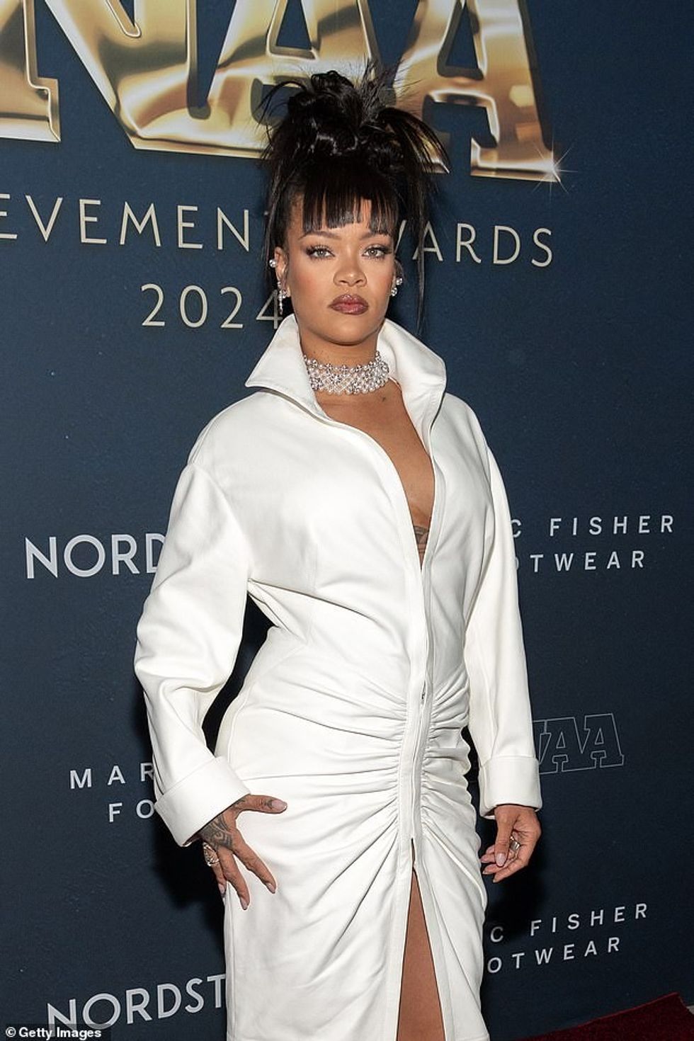 93460875 14232189 Rihanna is known for her fashion prowess but there s one look sh a 17 1735401814561