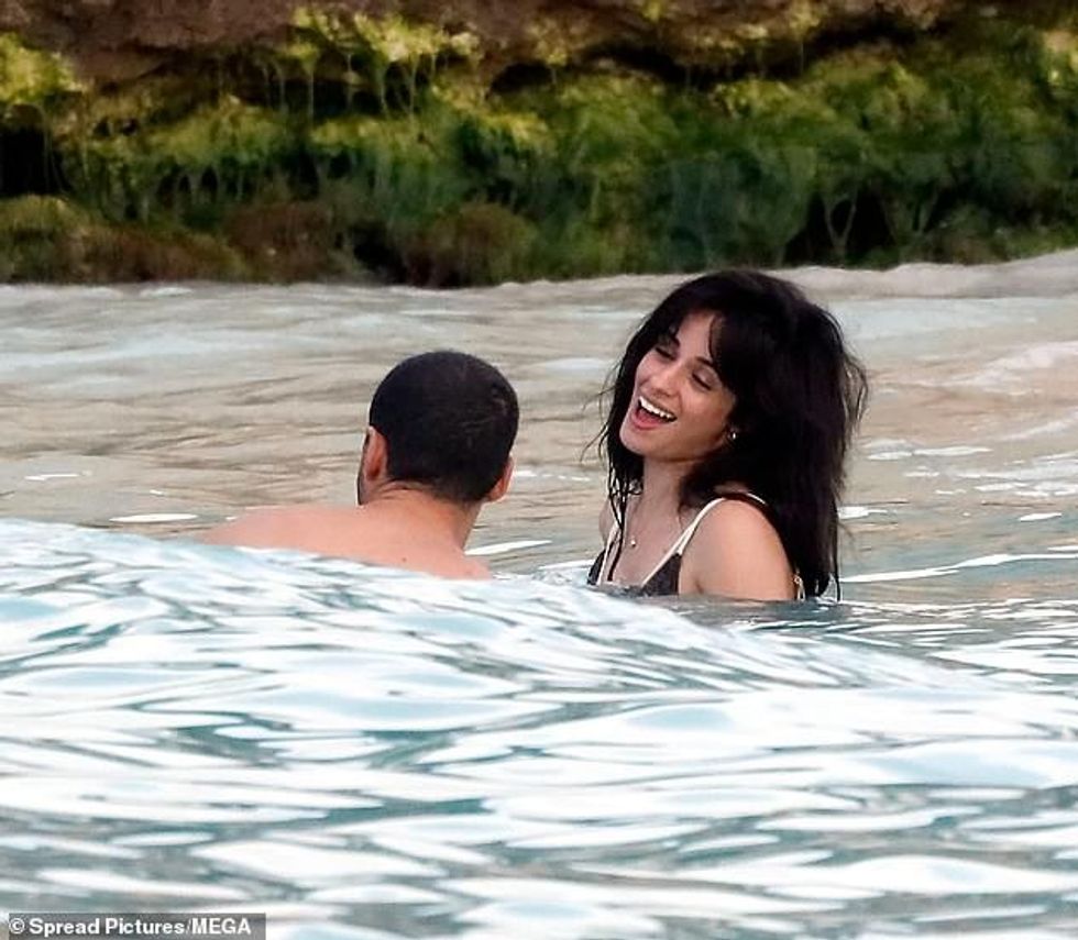 93755991 14252109 Cabello was radiant with joy as she beamed at her beau at one po a 8 1736099034613