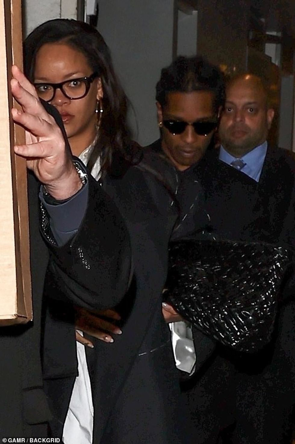 94729943 14347031 Rihanna 36 and A AP Rocky 36 looked somber in black as they head a 57 1738344836264