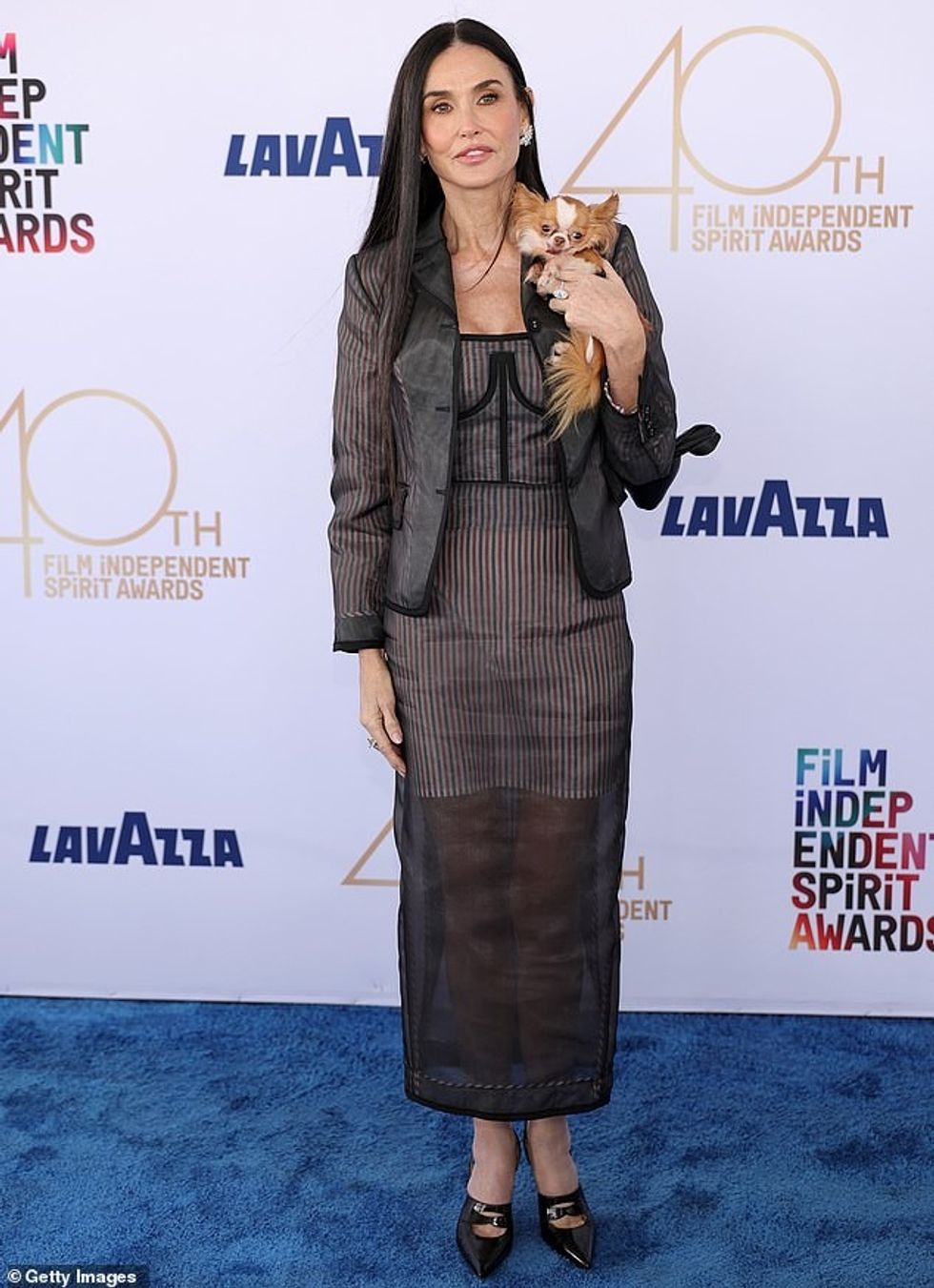 95484749 14425513 She slipped into a pair of closed toed black heels and layered t a 66 1740267832962