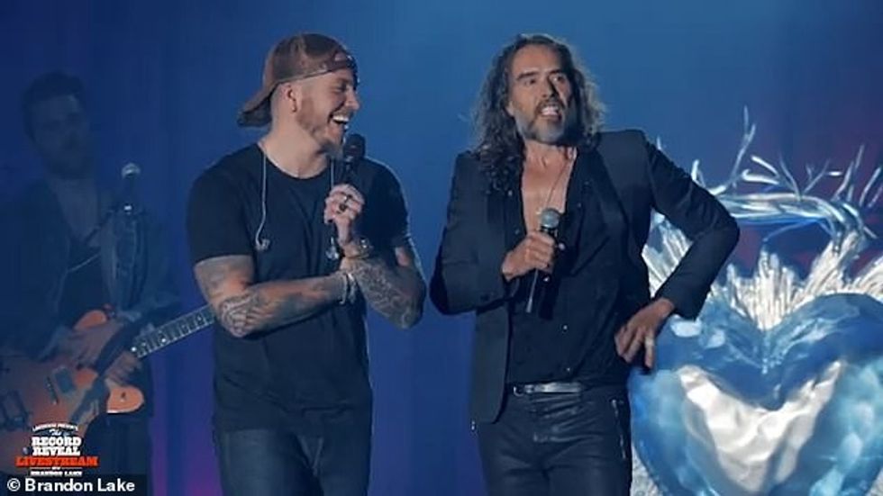 96926161 14571823 Russell Brand right attended a record reveal party for prominent a 88 1743780079558