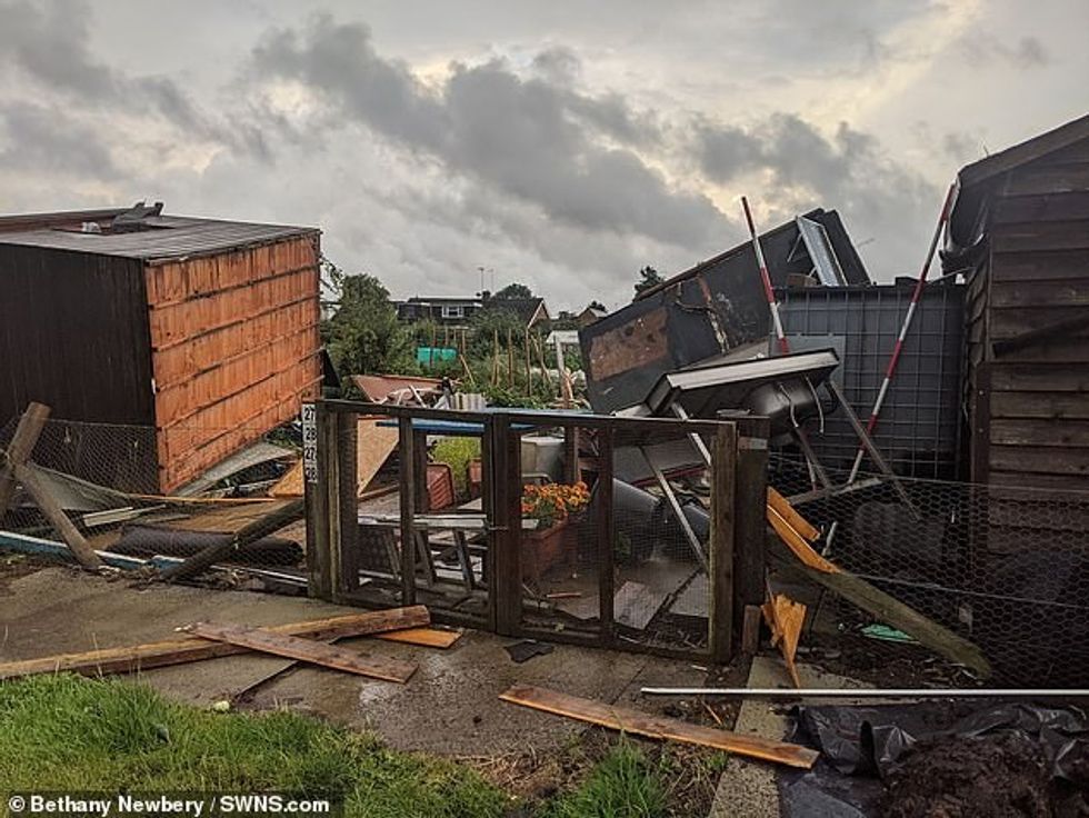 A tornado ripped through Northampton at around 8pm yesterday damaging homes and allotments. Pictured is the aftermath of the chaos