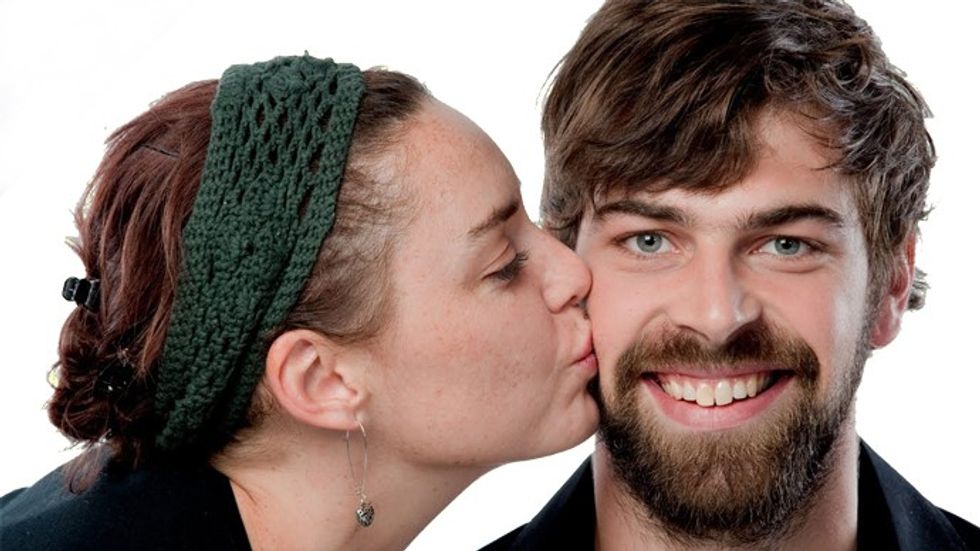 a woman kissing a man with a beard2