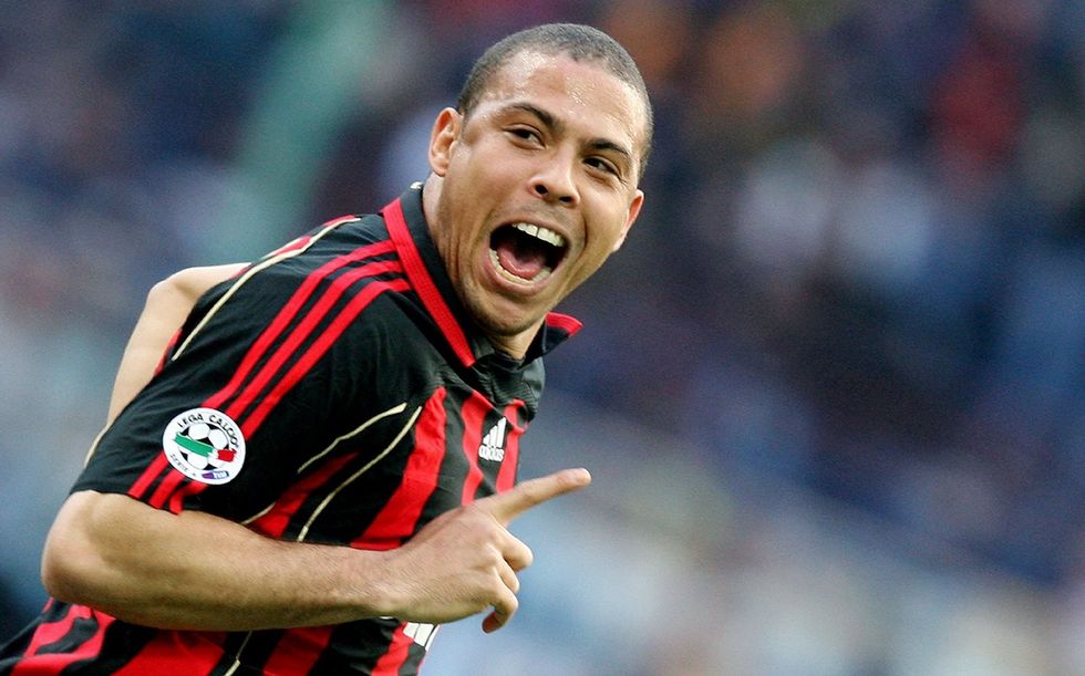 AC Milan's forward Ronaldo of Brazil celebrates after scoring a goal against Inter Milan during their italian serie A football match at San Siro stadium in Milan, 11 March 2007. AFP PHOTO / Paco SERINELLI