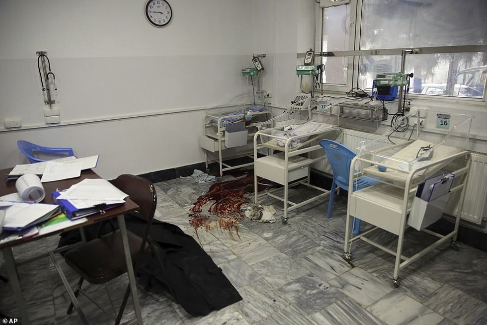 After opening fire on civilians, the gunmen then got into a shootout with security forces which ended several hours later when all three were shot dead (pictured, the scene inside one of the wards)