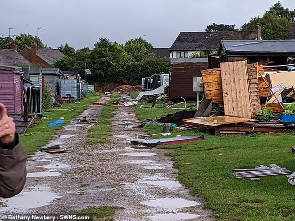 After the twister passed through the area, debris was seen littered across paths in the allotment