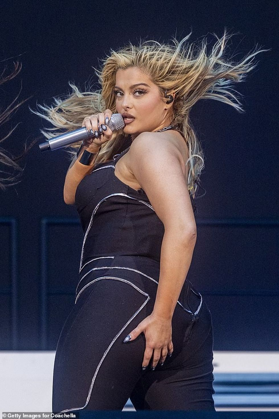 All the head-banging and desert wind sent her blonde locks into the air