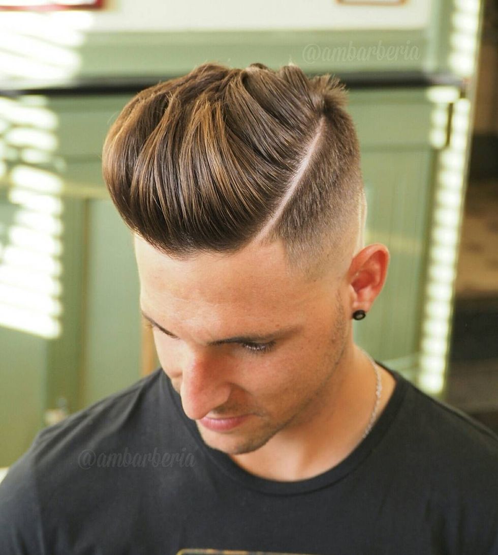 ambarberia pompadour hard part high fade haircut for men