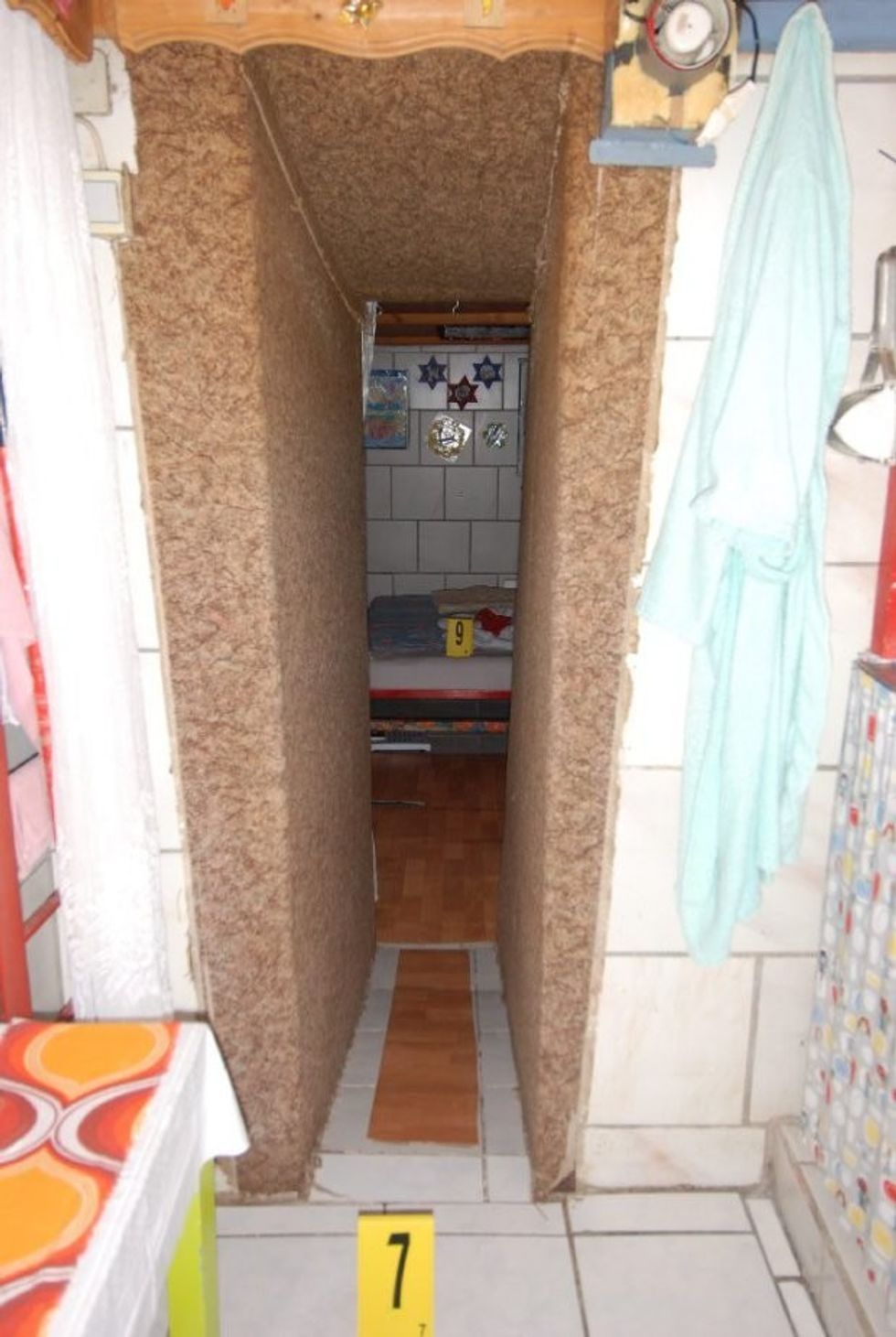 AMSTETTEN, AUSTRIA - UNDATED: In this undated Police handout image provided by Security Administration of Lower Austria a hidden bedroom at the house and hiding place, where a father imprisoned his daughter for 24 years and had seven children with her, is seen in Amstetten, Austria. According to police Josef Fritzl kept his daughter Elizabeth, now 42, imprisoned in his basement and sexually abused her. Three of the children, now aged 5, 18 and 19, had never seen the light of day until the eldest was recently taken to hospital because of a severe illness. (Photo by SID Lower Austria via Getty Images)