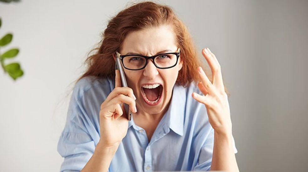 angry woman on cell phone