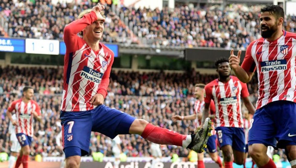 Antoine Griezmann L celebrates a goal
