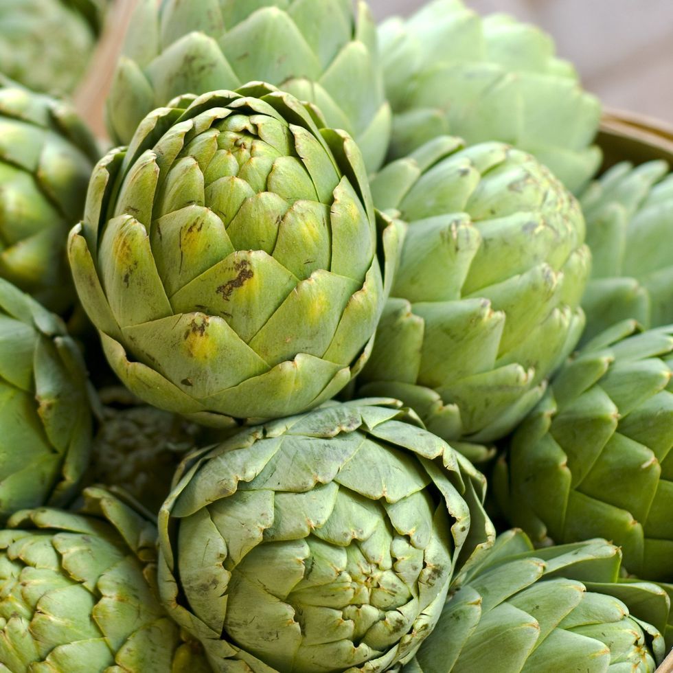 artichoke in baskets fresh spring vegetables at farmer s market 157315654 5aeb017ba18d9e0037f1af98