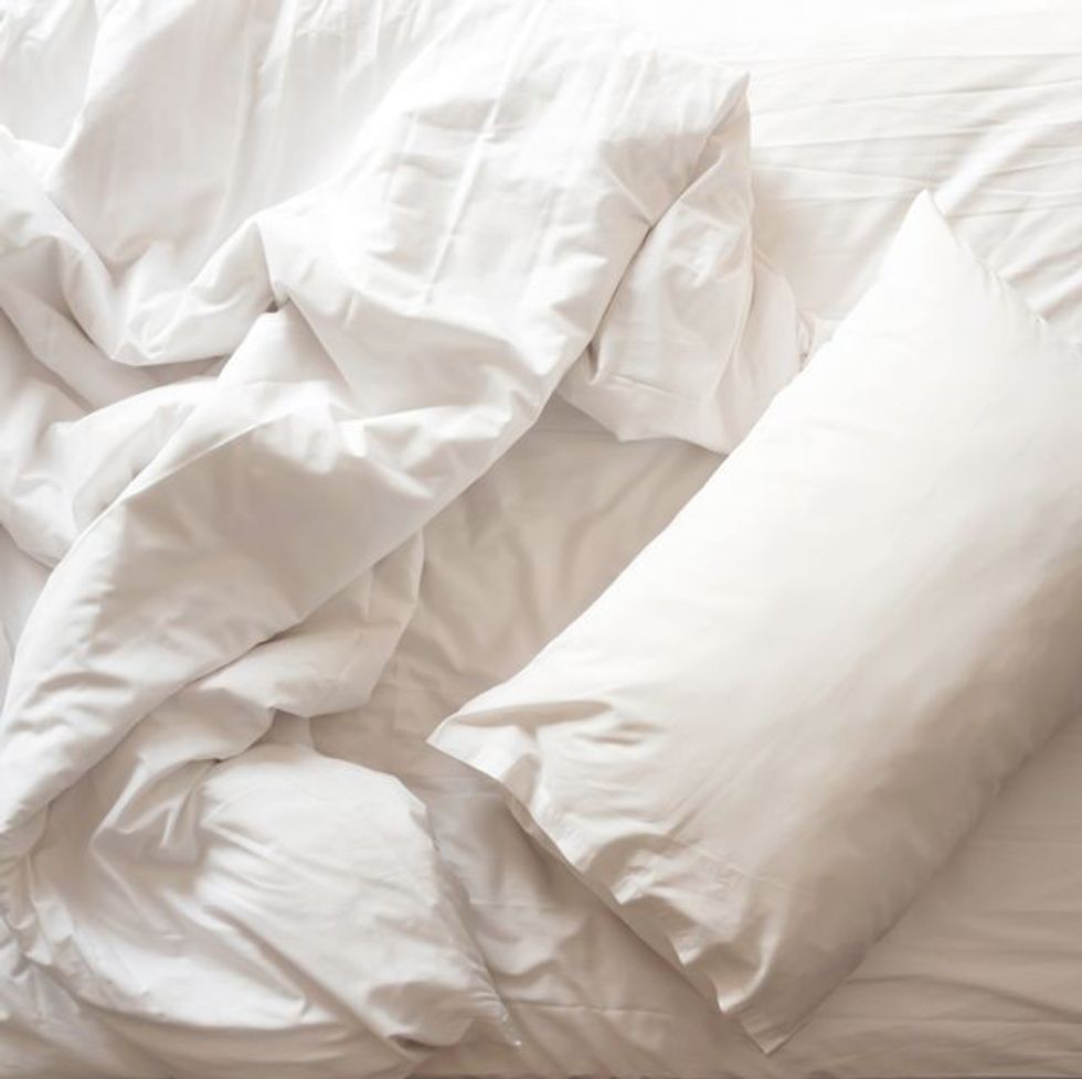 bed with sheets 1615218044