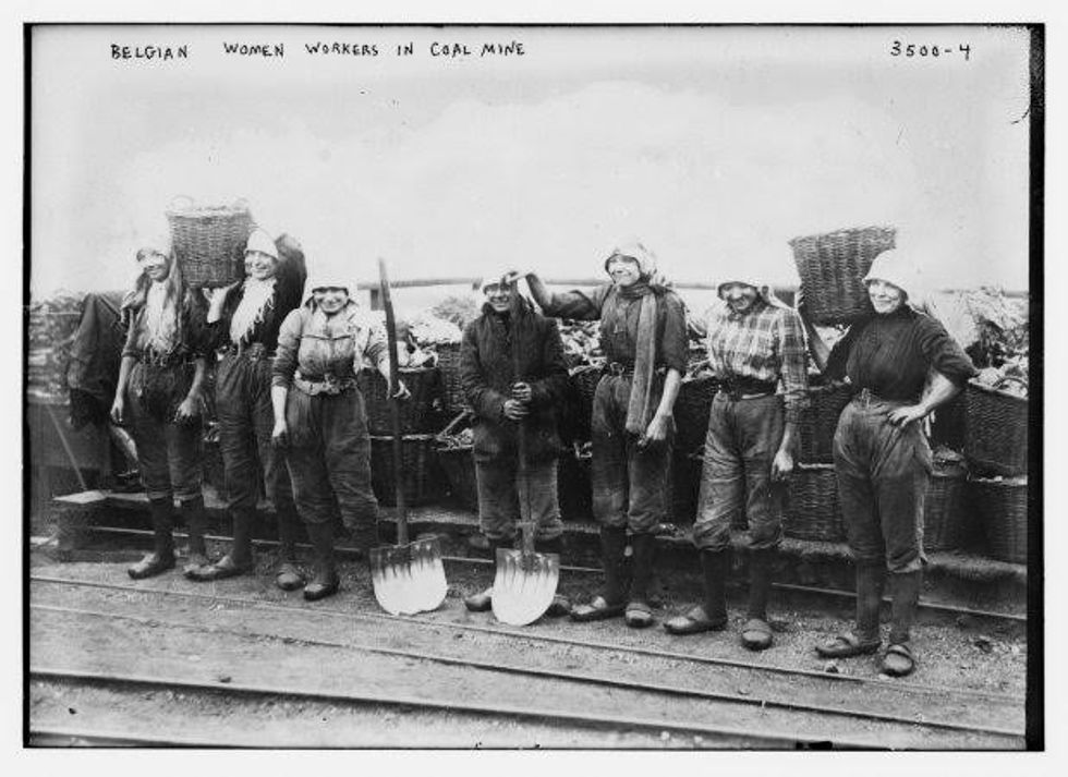Belgian women workers pose for a photograph as they stand in line holding baskets and shovels near a coal mine, circa 1910-1915, in this Library of Congress handout photo. For women 100 years ago, opportunities to work beyond the home and take part in political life were very limited. As the 20th century progressed, hard-won progress included gradually improved voting rights, while the upheaval of war pushed doors ajar as women worked as part of the war effort. U.S. Library of Congress archive photos show women's workplaces ranging from a flour mill in England to a coal mine in Belgium or Lincoln Motor Co.'s welding department in Detroit. International Women's Day is celebrated on March 8. REUTERS/Bain Collection/Library of Congress/Handout via Reuters SEARCH