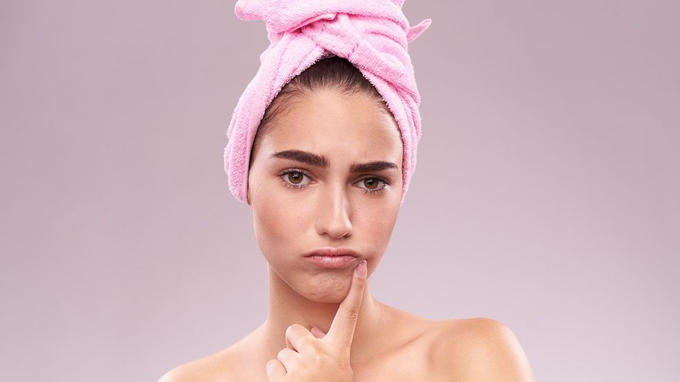 best serum woman about to put serum on her face