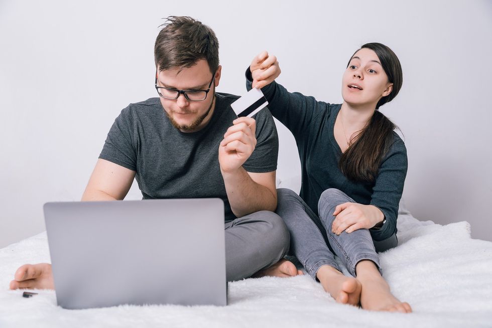 bigstock Couple Fight For Bank Card To 227706157